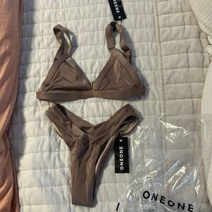 One one swimwear Kameron Top and Bottoms.  Brand new with tags